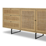 Featuring Carmel Natural Cane Sideboard 96" by Four Hands at Amethyst Home. Midcentury-inspired style with an organic twist. Surrounded by mango casing, light cane weaves for a fresh, natural look. Finished off with angular gunmetal-finished iron legs. Plenty of interior storage for your favorite table linens and dinnerware. Overall Dimensions: 96.00"w x 18.00". Amethyst Home provides interior design, new home construction design consulting, vintage area rugs, and lighting in the Omaha metro area.