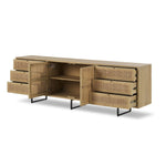 Featuring Carmel Natural Cane Sideboard 96" by Four Hands at Amethyst Home. Midcentury-inspired style with an organic twist. Surrounded by mango casing, light cane weaves for a fresh, natural look. Finished off with angular gunmetal-finished iron legs. Plenty of interior storage for your favorite table linens and dinnerware. Overall Dimensions: 96.00"w x 1. Amethyst Home provides interior design, new home construction design consulting, vintage area rugs, and lighting in the Scottsdale metro area.