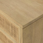 Featuring Carmel Natural Cane Sideboard 96" by Four Hands at Amethyst Home. Midcentury-inspired style with an organic twist. Surrounded by mango casing, light cane weaves for a fresh, natural look. Finished off with angular gunmetal-finished iron legs. Plenty of interior storage for your favorite table linens and dinnerware. Overall Dimensions: 96.00"w x 18.00". Amethyst Home provides interior design, new home construction design consulting, vintage area rugs, and lighting in the Tampa metro area.