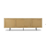 Featuring Carmel Natural Cane Sideboard 96" by Four Hands at Amethyst Home. Midcentury-inspired style with an organic twist. Surrounded by mango casing, light cane weaves for a fresh, natural look. Finished off with angular gunmetal-finished iron legs. Plenty of interior storage for your favorite table linens and dinnerware. Overall Dimensions: 96.00"w x 1. Amethyst Home provides interior design, new home construction design consulting, vintage area rugs, and lighting in the Washington metro area.
