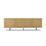 Featuring Carmel Natural Cane Sideboard 96" by Four Hands at Amethyst Home. Midcentury-inspired style with an organic twist. Surrounded by mango casing, light cane weaves for a fresh, natural look. Finished off with angular gunmetal-finished iron legs. Plenty of interior storage for your favorite table linens and dinnerware. Overall Dimensions: 96.00"w x 1. Amethyst Home provides interior design, new home construction design consulting, vintage area rugs, and lighting in the Washington metro area.