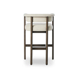 Featuring Cassie Charter Oatmeal Bar + Counter Stool by Four Hands at Amethyst Home. Upholstered in high-performance fabric, this sculpted bar stool features a comfortable yoke back and exterior fold detailing, all framed by solid ash. Performance fabrics are specially created to withstand spills, stains, high traffic and wear, ensuring long-term comfort and u. Amethyst Home provides interior design, new home construction design consulting, vintage area rugs, and lighting in the Boston metro area.