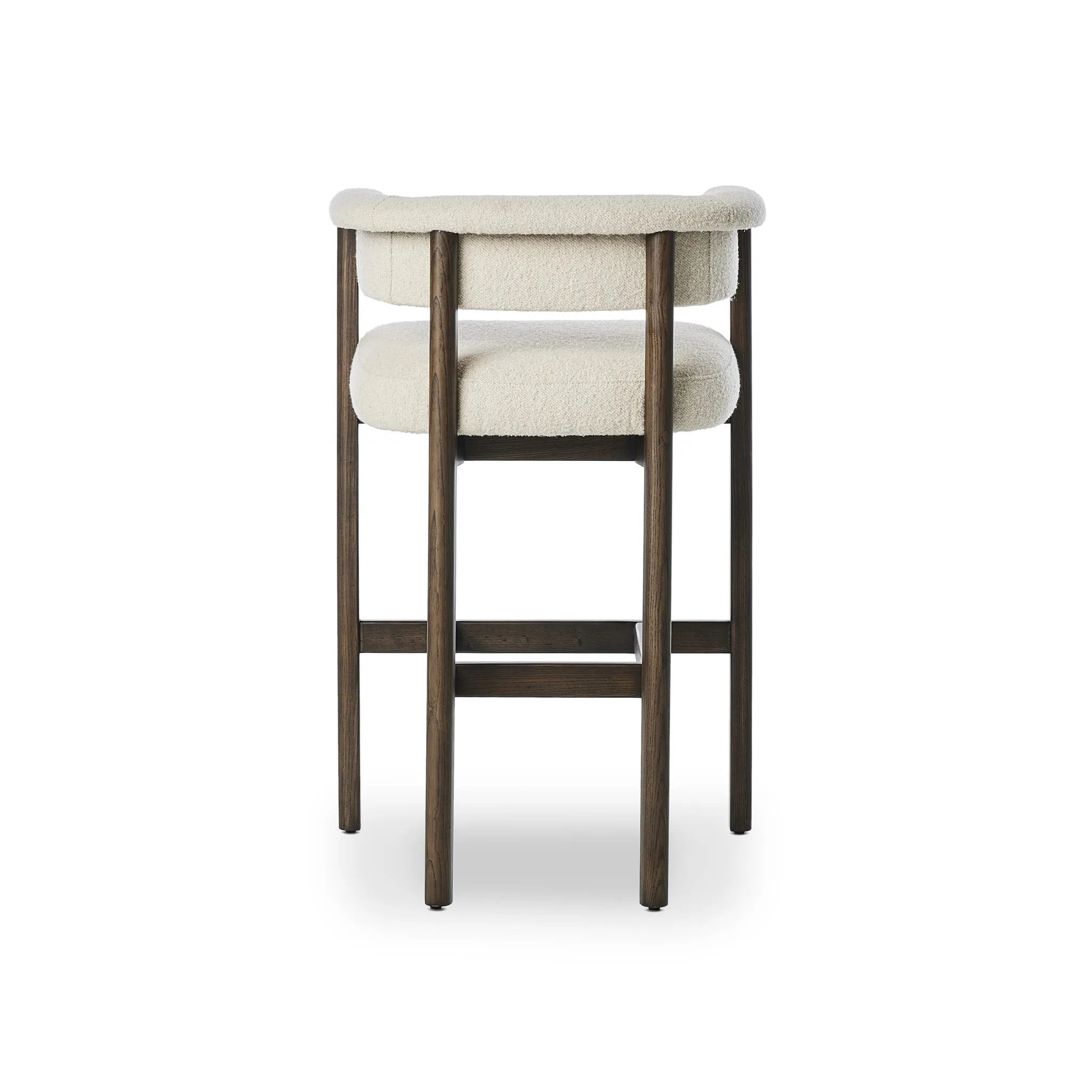 Featuring Cassie Charter Oatmeal Bar + Counter Stool by Four Hands at Amethyst Home. Upholstered in high-performance fabric, this sculpted bar stool features a comfortable yoke back and exterior fold detailing, all framed by solid ash. Performance fabrics are specially created to withstand spills, stains, high traffic and wear, ensuring long-term comfort and u. Amethyst Home provides interior design, new home construction design consulting, vintage area rugs, and lighting in the Boston metro area.