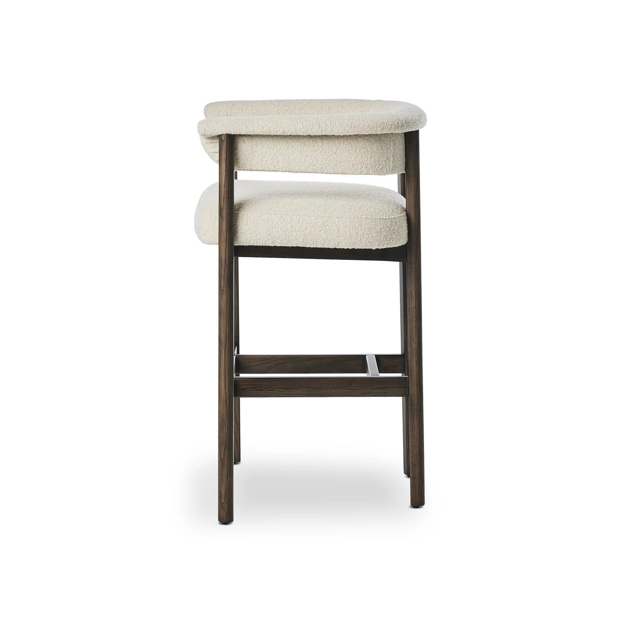 Featuring Cassie Charter Oatmeal Bar + Counter Stool by Four Hands at Amethyst Home. Upholstered in high-performance fabric, this sculpted bar stool features a comfortable yoke back and exterior fold detailing, all framed by solid ash. Performance fabrics are specially created to withstand spills, stains, high traffic and wear, ensuring long-term comfort and un. Amethyst Home provides interior design, new home construction design consulting, vintage area rugs, and lighting in the Miami metro area.