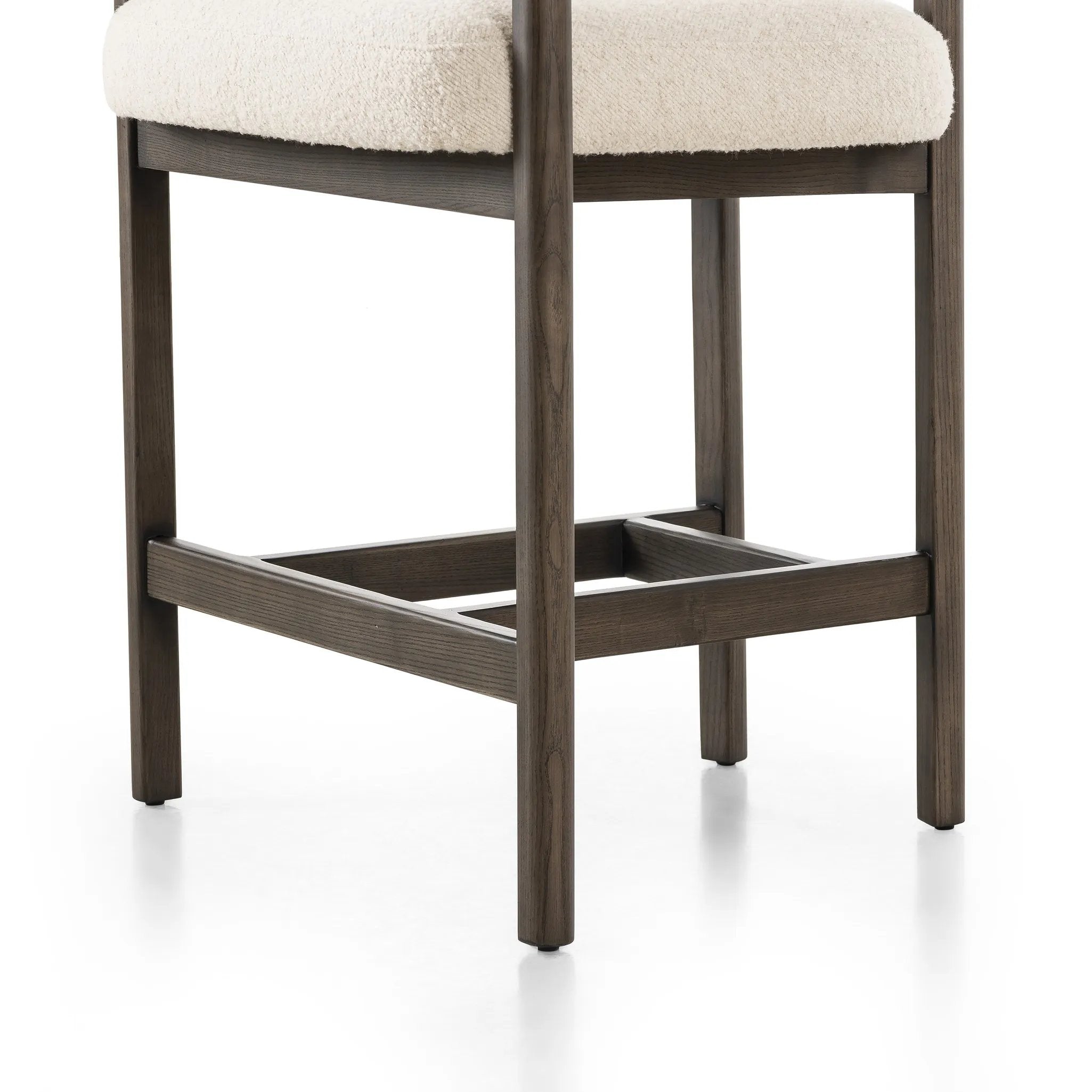 Featuring Cassie Charter Oatmeal Bar + Counter Stool by Four Hands at Amethyst Home. Upholstered in high-performance fabric, this sculpted bar stool features a comfortable yoke back and exterior fold detailing, all framed by solid ash. Performance fabrics are specially created to withstand spills, stains, high traffic and wear, ensuring long-term comfor. Amethyst Home provides interior design, new home construction design consulting, vintage area rugs, and lighting in the Newport Beach metro area.