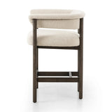 Featuring Cassie Charter Oatmeal Bar + Counter Stool by Four Hands at Amethyst Home. Upholstered in high-performance fabric, this sculpted bar stool features a comfortable yoke back and exterior fold detailing, all framed by solid ash. Performance fabrics are specially created to withstand spills, stains, high traffic and wear, ensuring long-term comfort and un. Amethyst Home provides interior design, new home construction design consulting, vintage area rugs, and lighting in the Omaha metro area.
