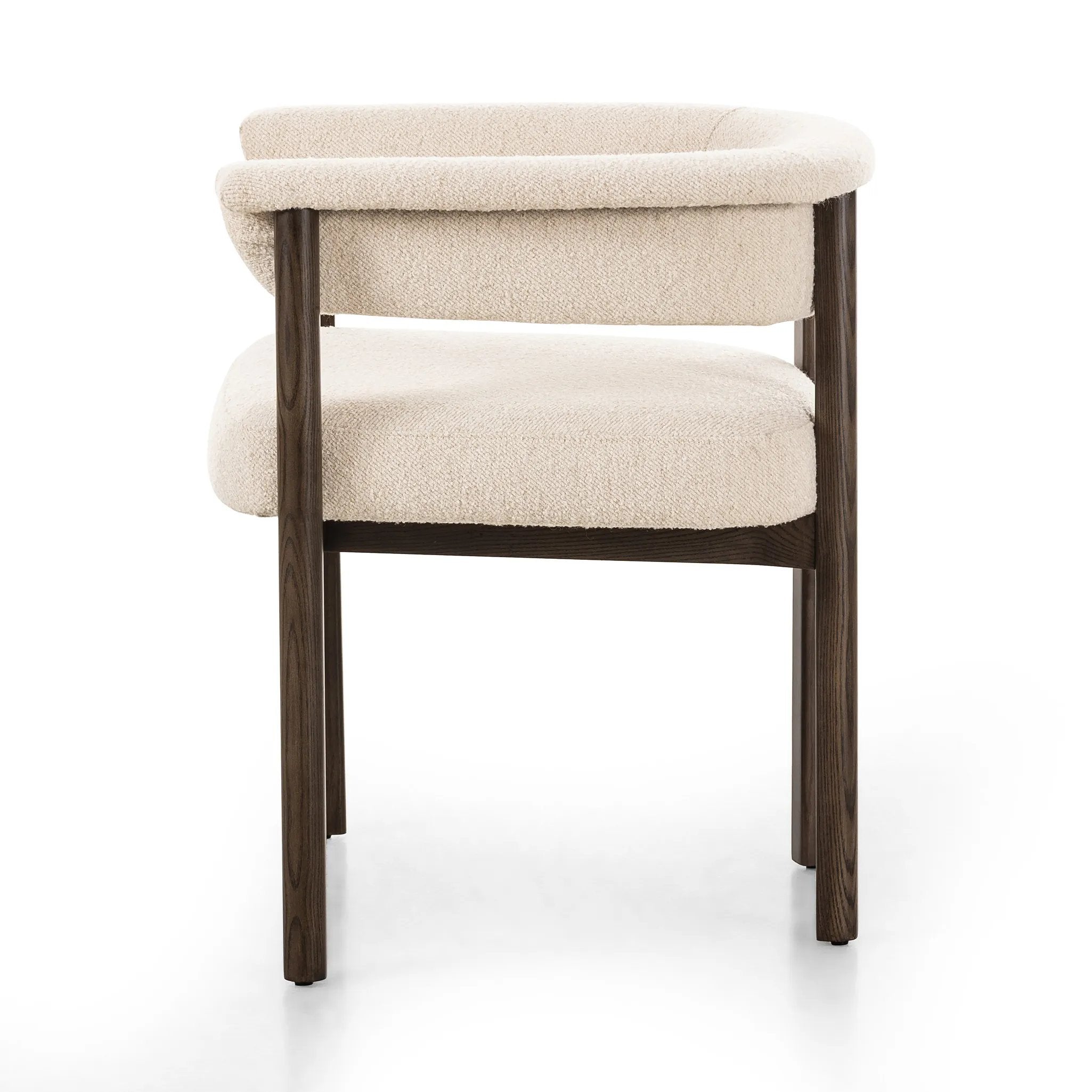 Featuring Cassie Charter Oatmeal Dining Chair by Four Hands at Amethyst Home. Upholstered in high-performance fabric, this sculpted dining style features a comfortable yoke back and exterior fold detailing, all framed by solid ash. Performance fabrics are specially created to withstand spills, stains, high traffic and wear, ensuring long-term comfort and un. Amethyst Home provides interior design, new home construction design consulting, vintage area rugs, and lighting in the Calabasas metro area.