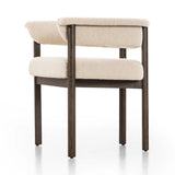 Featuring Cassie Charter Oatmeal Dining Chair by Four Hands at Amethyst Home. Upholstered in high-performance fabric, this sculpted dining style features a comfortable yoke back and exterior fold detailing, all framed by solid ash. Performance fabrics are specially created to withstand spills, stains, high traffic and wear, ensuring long-term comfort and un. Amethyst Home provides interior design, new home construction design consulting, vintage area rugs, and lighting in the Park City metro area.