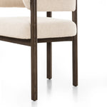 Featuring Cassie Charter Oatmeal Dining Chair by Four Hands at Amethyst Home. Upholstered in high-performance fabric, this sculpted dining style features a comfortable yoke back and exterior fold detailing, all framed by solid ash. Performance fabrics are specially created to withstand spills, stains, high traffic and wear, ensuring long-term comfort and unma. Amethyst Home provides interior design, new home construction design consulting, vintage area rugs, and lighting in the Seattle metro area.
