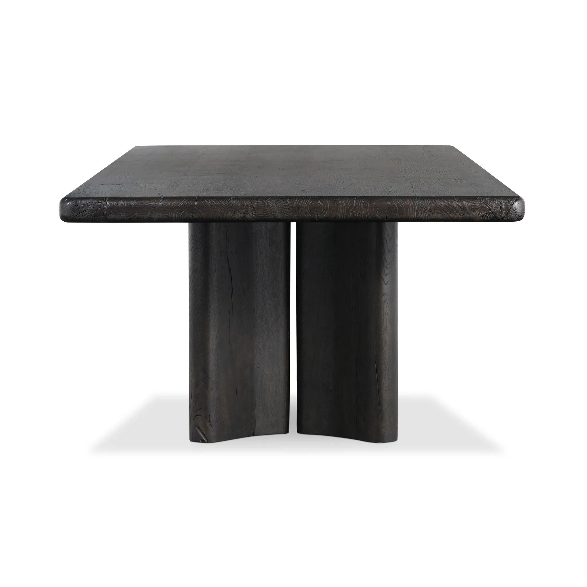 Designed in partnership with longtime Four Hands collaborator Thomas Bina and Brazilian designer Ronald Sasson, a grand-scale dining table is made from solid reclaimed French oak finished in a deep espresso. Rounded edges add a softer, fluid look. Seats 12 Amethyst Home provides interior design, new home construction design consulting, vintage area rugs, and lighting in the Laguna Beach metro area.