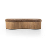 Elevate any room with a curvy statement bench. Made from a kidney-shaped base of toasted ash veneer and a soft, velvety seat Amethyst Home provides interior design, new home construction design consulting, vintage area rugs, and lighting in the Boston metro area.