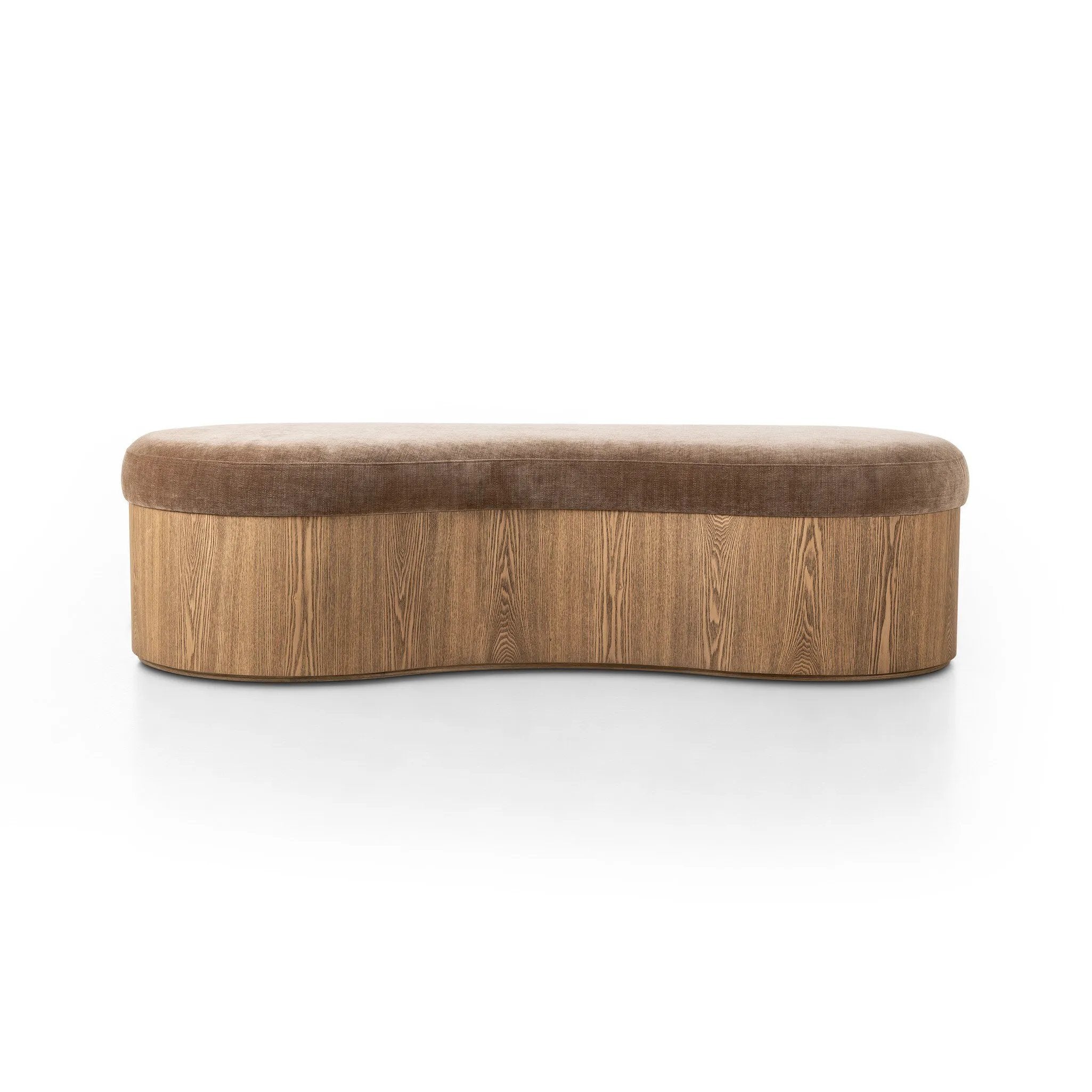 Elevate any room with a curvy statement bench. Made from a kidney-shaped base of toasted ash veneer and a soft, velvety seat Amethyst Home provides interior design, new home construction design consulting, vintage area rugs, and lighting in the Boston metro area.