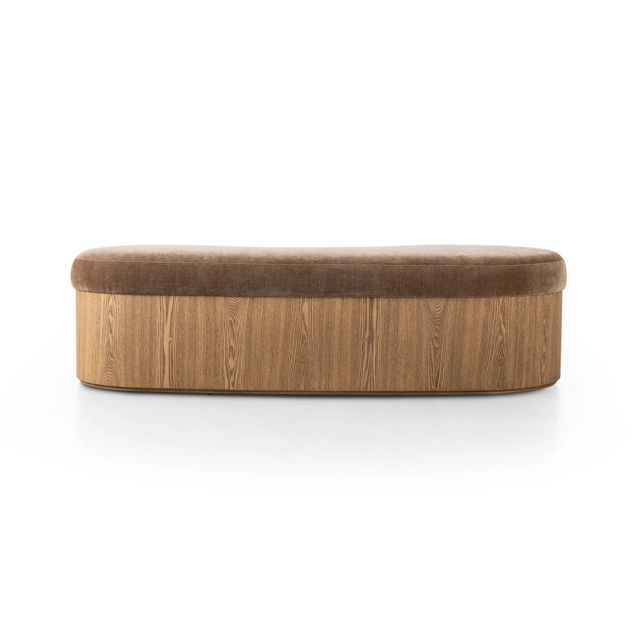 Elevate any room with a curvy statement bench. Made from a kidney-shaped base of toasted ash veneer and a soft, velvety seat Amethyst Home provides interior design, new home construction design consulting, vintage area rugs, and lighting in the Calabasas metro area.