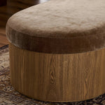 Elevate any room with a curvy statement bench. Made from a kidney-shaped base of toasted ash veneer and a soft, velvety seat Amethyst Home provides interior design, new home construction design consulting, vintage area rugs, and lighting in the Laguna Beach metro area.