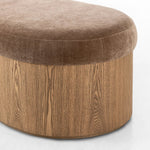 Elevate any room with a curvy statement bench. Made from a kidney-shaped base of toasted ash veneer and a soft, velvety seat Amethyst Home provides interior design, new home construction design consulting, vintage area rugs, and lighting in the Nashville metro area.
