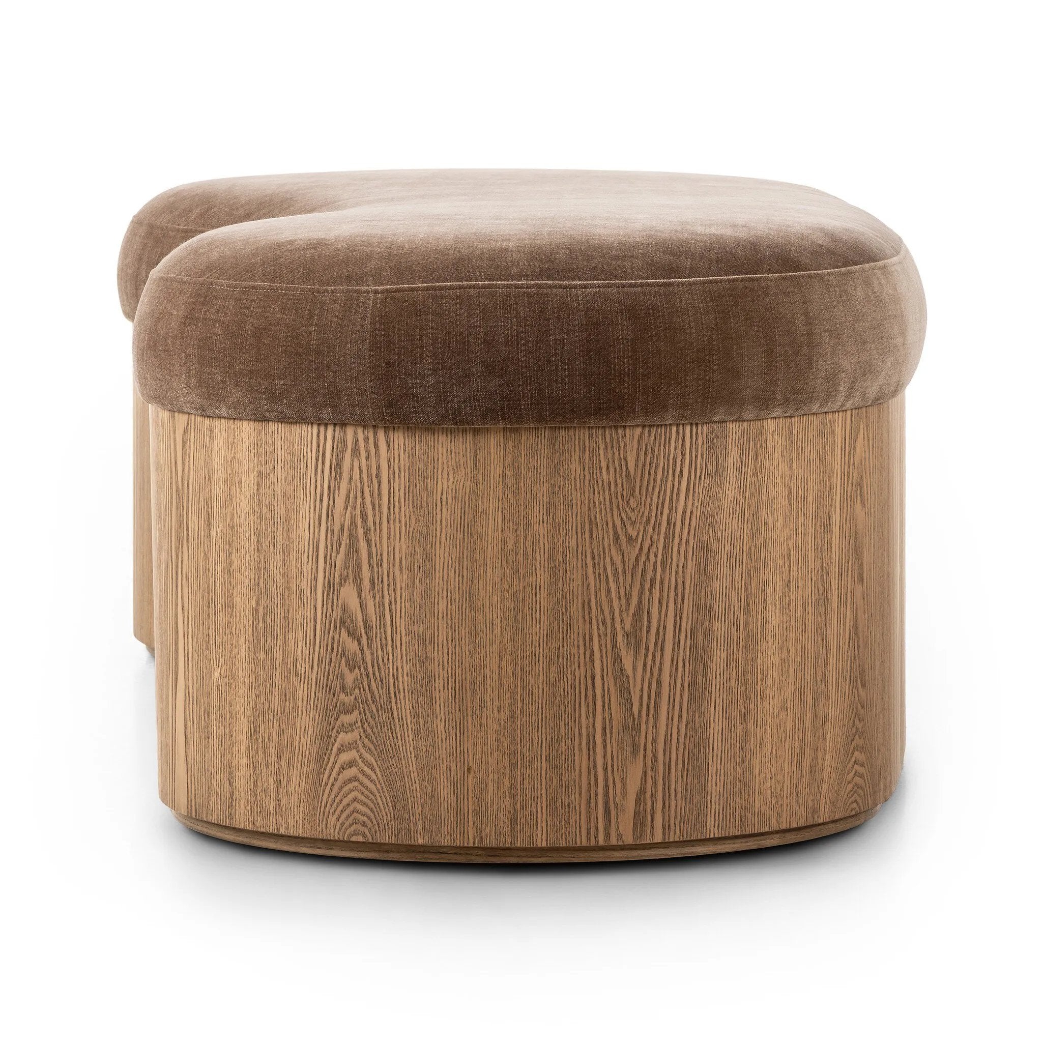 Elevate any room with a curvy statement bench. Made from a kidney-shaped base of toasted ash veneer and a soft, velvety seat Amethyst Home provides interior design, new home construction design consulting, vintage area rugs, and lighting in the Newport Beach metro area.