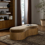 Elevate any room with a curvy statement bench. Made from a kidney-shaped base of toasted ash veneer and a soft, velvety seat Amethyst Home provides interior design, new home construction design consulting, vintage area rugs, and lighting in the Park City metro area.