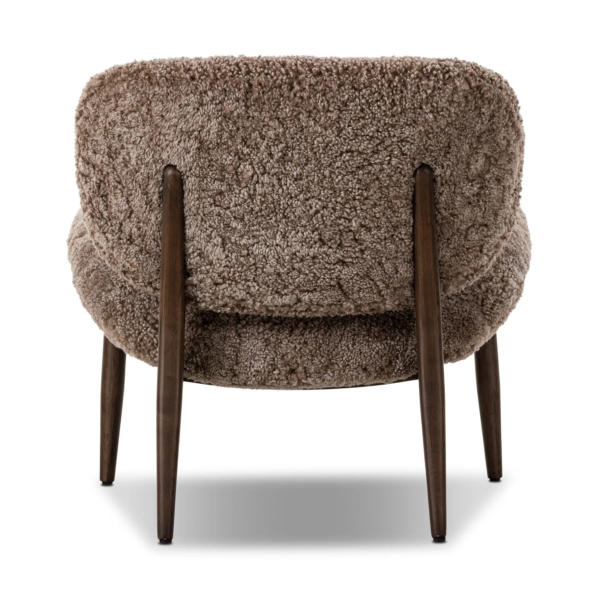 The perfect accent chair, designed for unwinding. Upholstered in a velvety olive chenille made from recycled materials, with wide proportions and cozy curves and cushioning. Slim, tapered wooden legs balance the look Amethyst Home provides interior design, new home construction design consulting, vintage area rugs, and lighting in the Los Angeles metro area.
