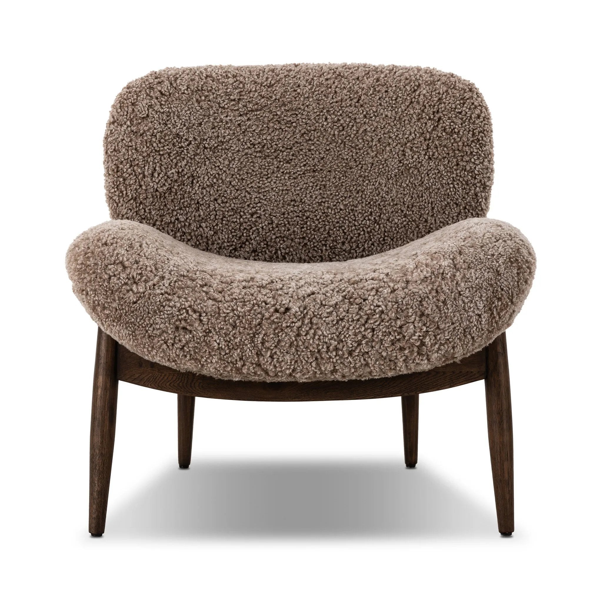 The perfect accent chair, designed for unwinding. Upholstered in a velvety olive chenille made from recycled materials, with wide proportions and cozy curves and cushioning. Slim, tapered wooden legs balance the look Amethyst Home provides interior design, new home construction design consulting, vintage area rugs, and lighting in the Monterey metro area.