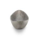 Statement-making centerpiece bowl featuring dramatic swooping lines, taking inspiration from Japanese fishing canoes. Cast in solid aluminum and supported by a single pedestal foot, giving the illusion that it's truly floating off the table.As lovers of clean design at Amethyst, we love the designer inspired Cerys Bowl - Raw Antique Nickel. Amethyst Home provides interior design, new home construction design consulting, vintage area rugs, and lighting in the Winter Garden metro area.