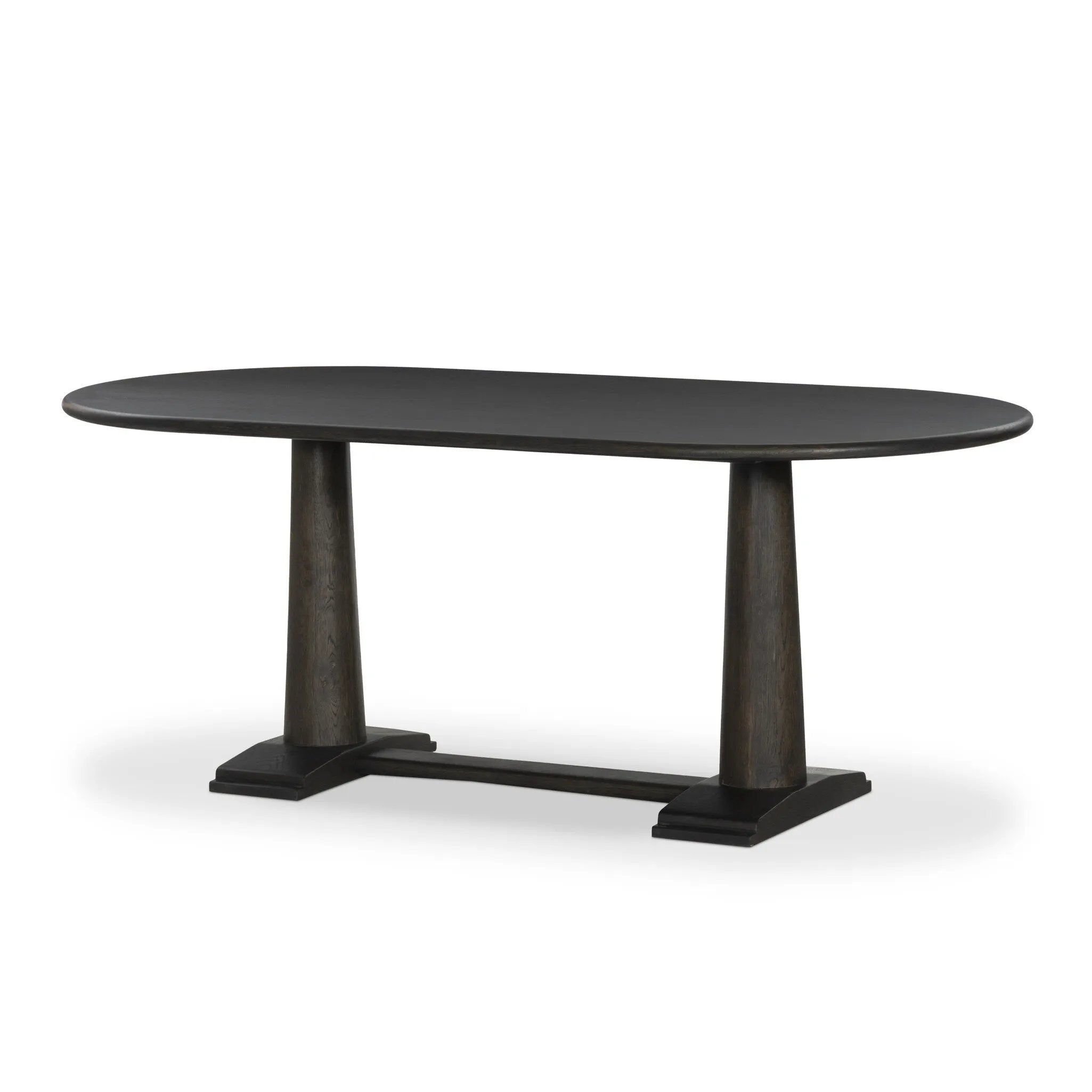 Finished in a rich espresso, a mix of solid oak and oak veneers fashion a trestle-style base with tapered column legs and step detailing, for a traditional look.As fans of natural design at Amethyst, we love the nature inspired Chamberlain Dining Table - Espresso Oak Veneer. Amethyst Home provides interior design, new home construction design consulting, vintage area rugs, and lighting in the Kansas City metro area.