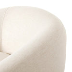 Inspired by French modernism with a nod to Jean Royere's design classic, the Polaire. Our take is defined by exaggerated curves, tapered arms and oversized welt detailing along the reversible seat cushion for a tailored look, finished with a 360-degree swivel. Amethyst Home provides interior design, new home construction design consulting, vintage area rugs, and lighting in the Calabasas metro area.
