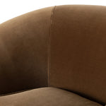 Inspired by French modernism with a nod to Jean Royere's design classic, the Polaire. Our take is defined by exaggerated curves, tapered arms and oversized welt detailing along the reversible seat cushion for a tailored look, finished with a 360-degree swivel. Amethyst Home provides interior design, new home construction design consulting, vintage area rugs, and lighting in the Omaha metro area.