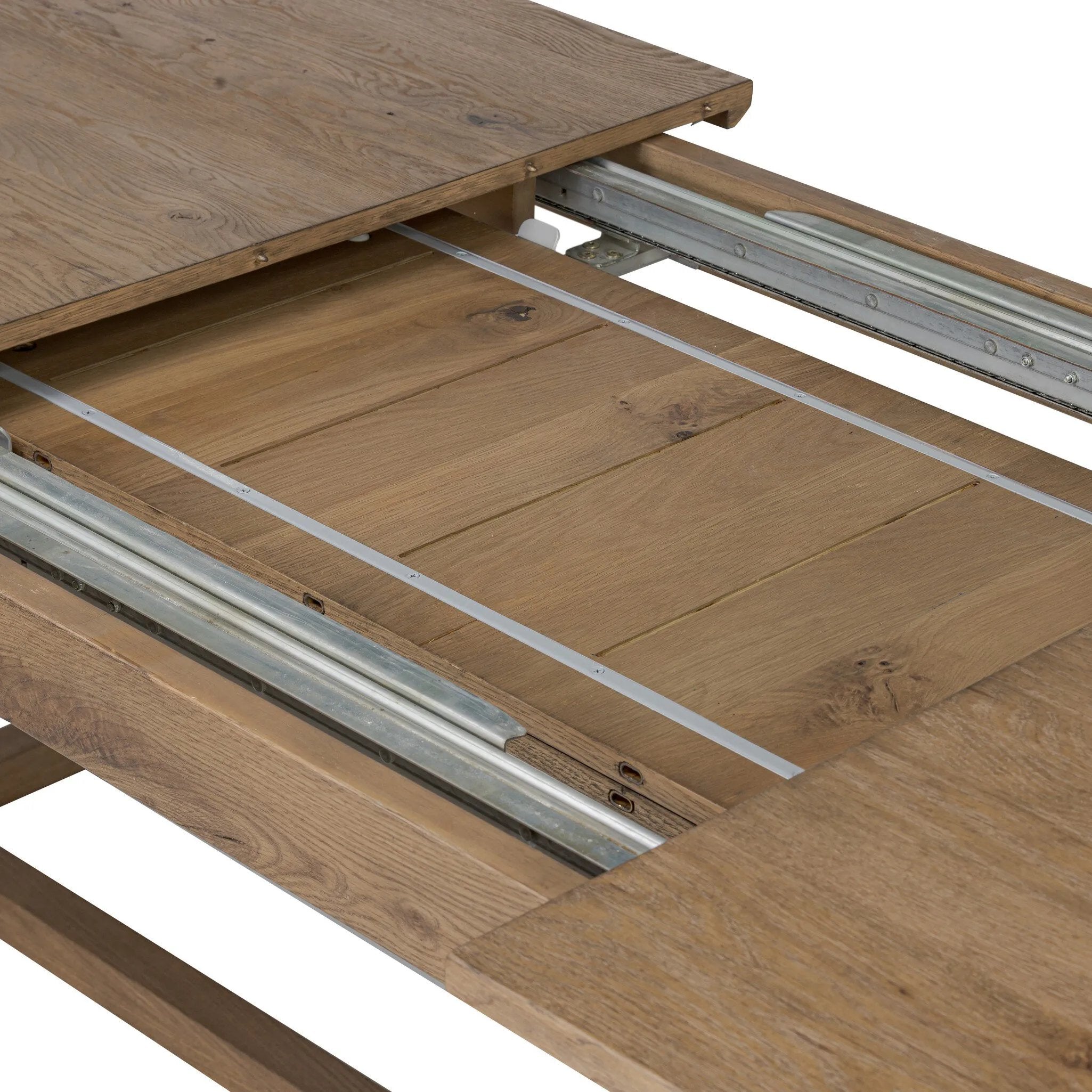 For dinners and buffets, large to small, this extension dining table serves the purpose. A low, trestle base of solid oak and veneers support the rectangular tabletop with a warm, drifted finish. On both ends, breadboard extensions provide the option to expand from 96" to 136" Amethyst Home provides interior design, new home construction design consulting, vintage area rugs, and lighting in the Winter Garden metro area.