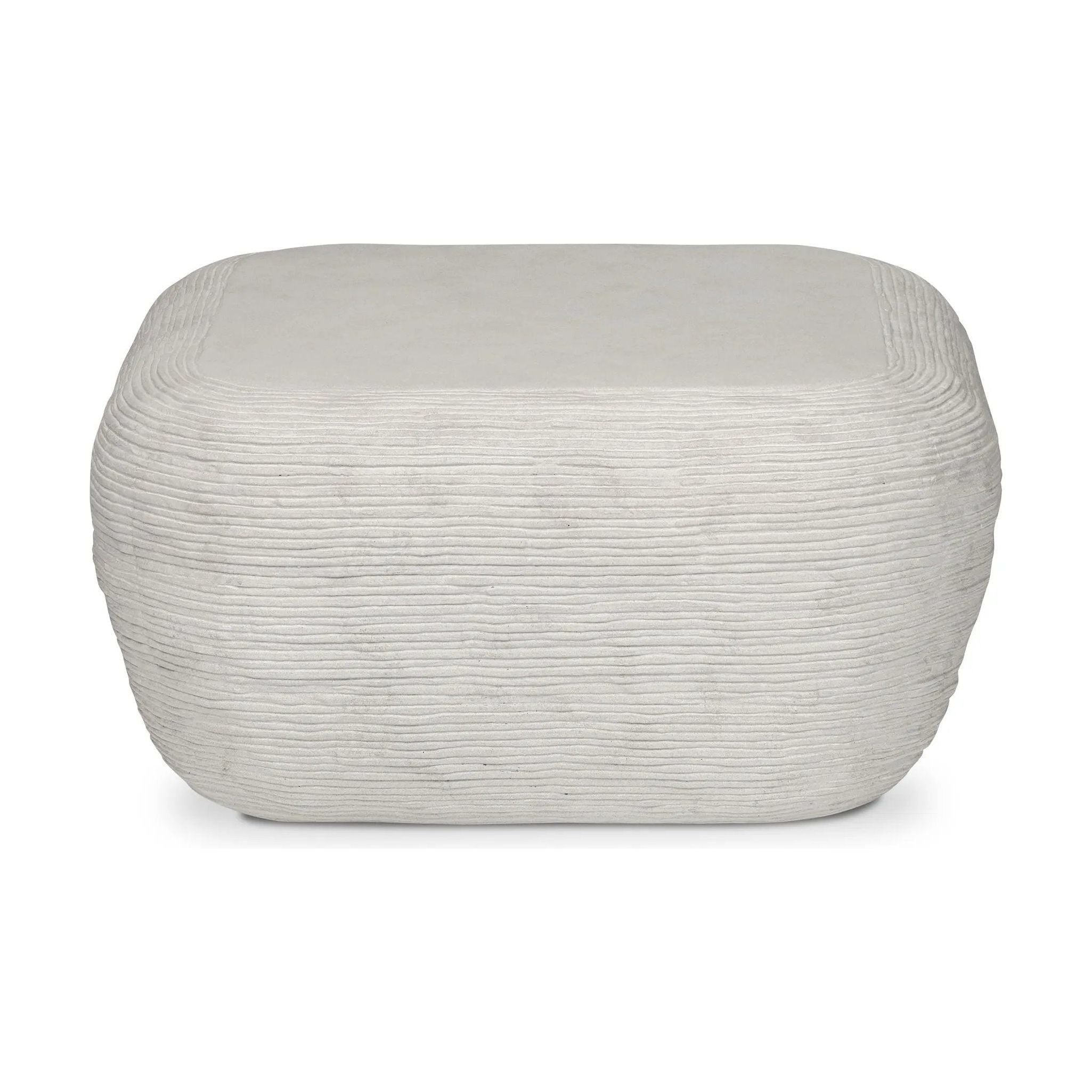 Smooth concrete is etched with a linear pattern, bringing an organic look with texture to this block-style coffee table Amethyst Home provides interior design, new home construction design consulting, vintage area rugs, and lighting in the Seattle metro area.