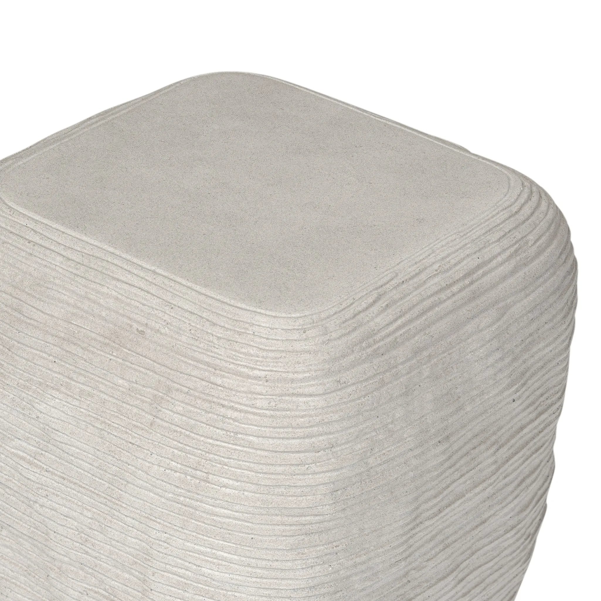 Featuring Cirri Smooth Lunar Concrete End Table by Four Hands at Amethyst Home. Smooth concrete is etched with a linear pattern, bringing an organic look with texture to this block-style end table.Overall Dimensions: 15.75"w x 15.75"d x 19.75"hWeight : 42.99 lbsMaterials: Concrete Solid. Amethyst Home provides interior design, new home construction design consulting, vintage area rugs, and lighting in the Calabasas metro area.