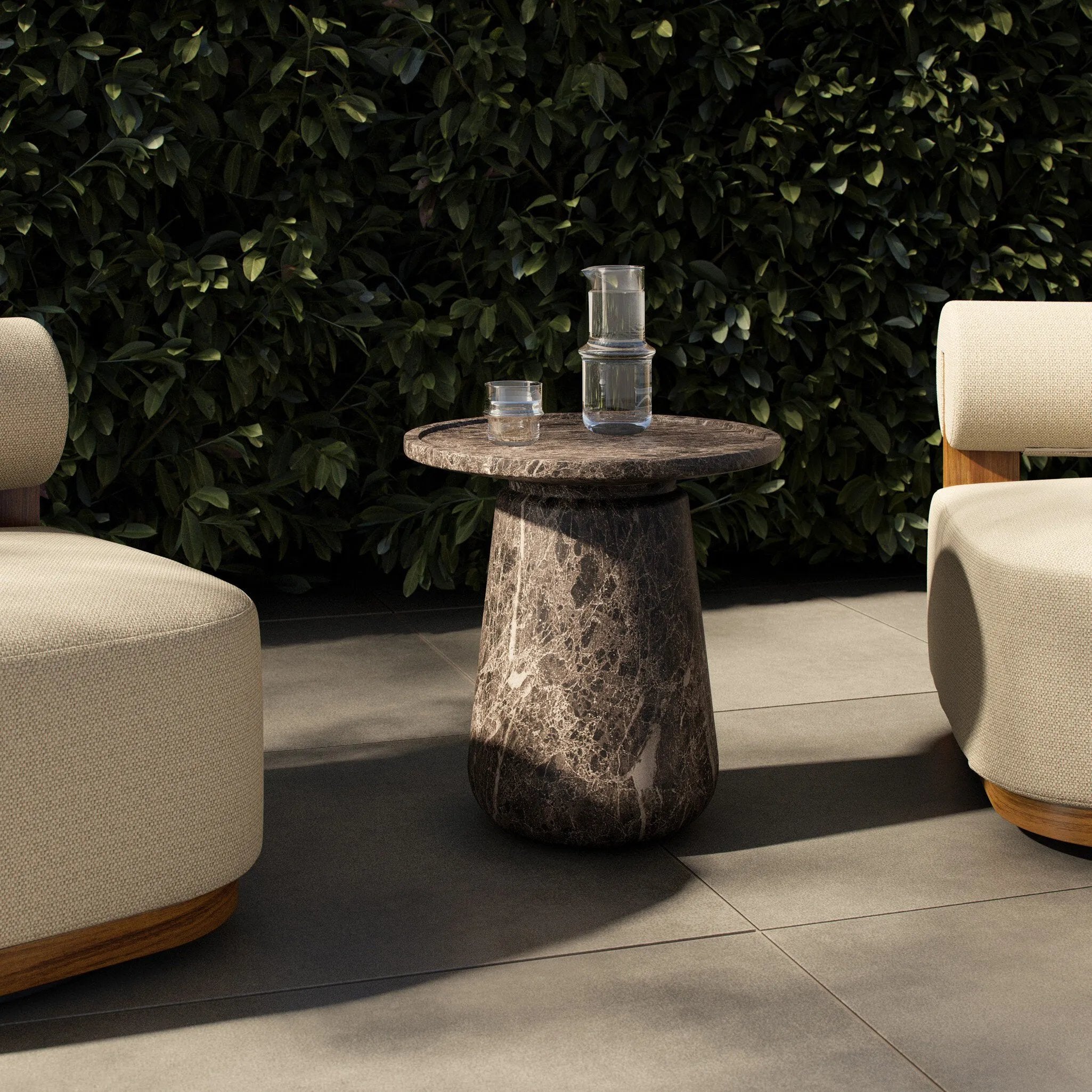 The classic pedestal shape gets a textural update on this outdoor end table. Cast concrete is finished with a water transfer technique to mimic marble, highlighting texture for a feel like natural stone. Cover or store inside during inclement weather and when not in use. Amethyst Home provides interior design, new home construction design consulting, vintage area rugs, and lighting in the San Diego metro area.