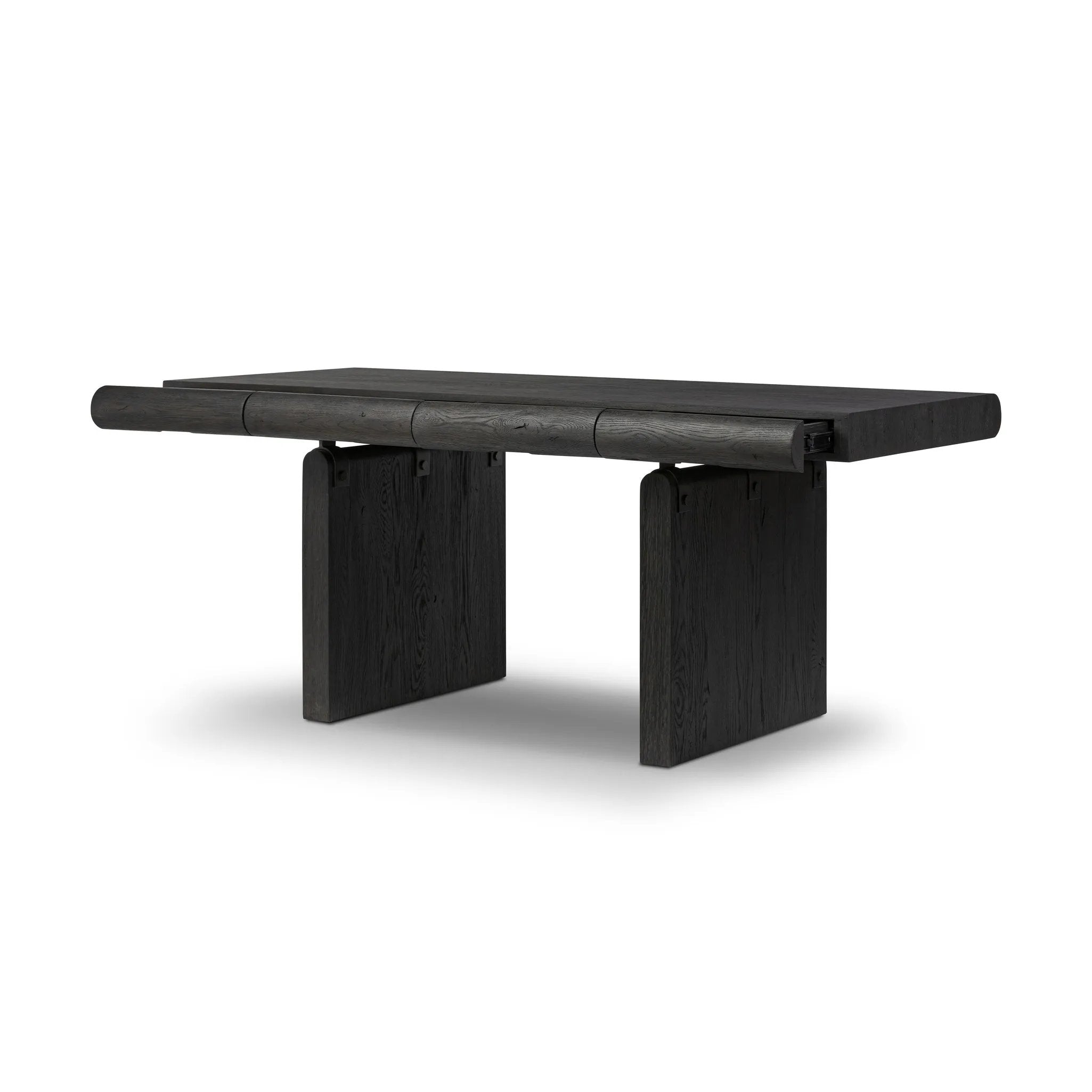 Bring a beautifully contoured look to your workspace with a desk inspired by Italian postmodernism. Connected by iron brackets, a dual-panel base supports a spacious tabletop of worn black oak, crafting a float-like look. Four drawers keep frequently used items within reach Amethyst Home provides interior design, new home construction design consulting, vintage area rugs, and lighting in the Austin metro area.