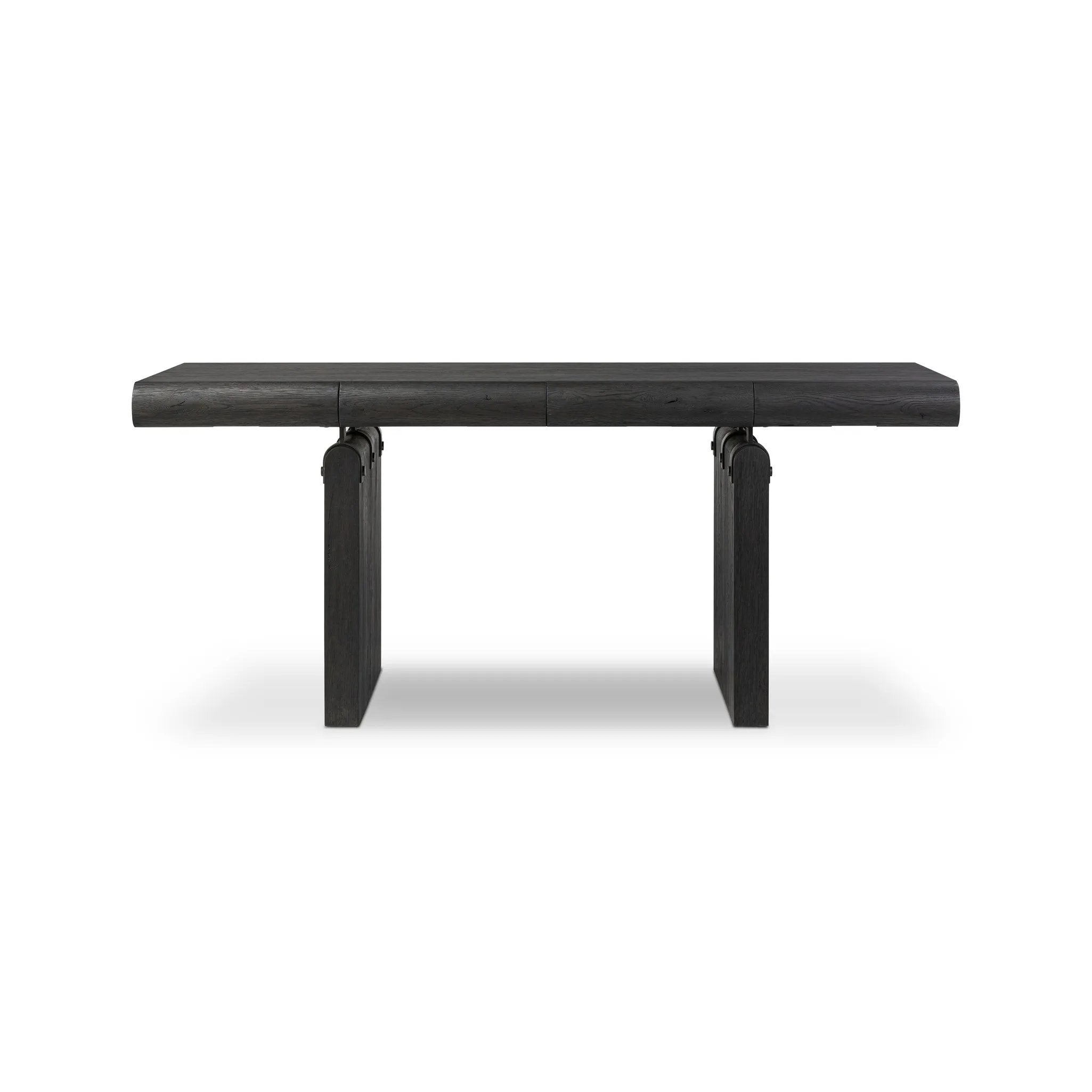 Bring a beautifully contoured look to your workspace with a desk inspired by Italian postmodernism. Connected by iron brackets, a dual-panel base supports a spacious tabletop of worn black oak, crafting a float-like look. Four drawers keep frequently used items within reach Amethyst Home provides interior design, new home construction design consulting, vintage area rugs, and lighting in the Boston metro area.
