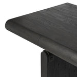 Bring a beautifully contoured look to your workspace with a desk inspired by Italian postmodernism. Connected by iron brackets, a dual-panel base supports a spacious tabletop of worn black oak, crafting a float-like look. Four drawers keep frequently used items within reach Amethyst Home provides interior design, new home construction design consulting, vintage area rugs, and lighting in the Charlotte metro area.