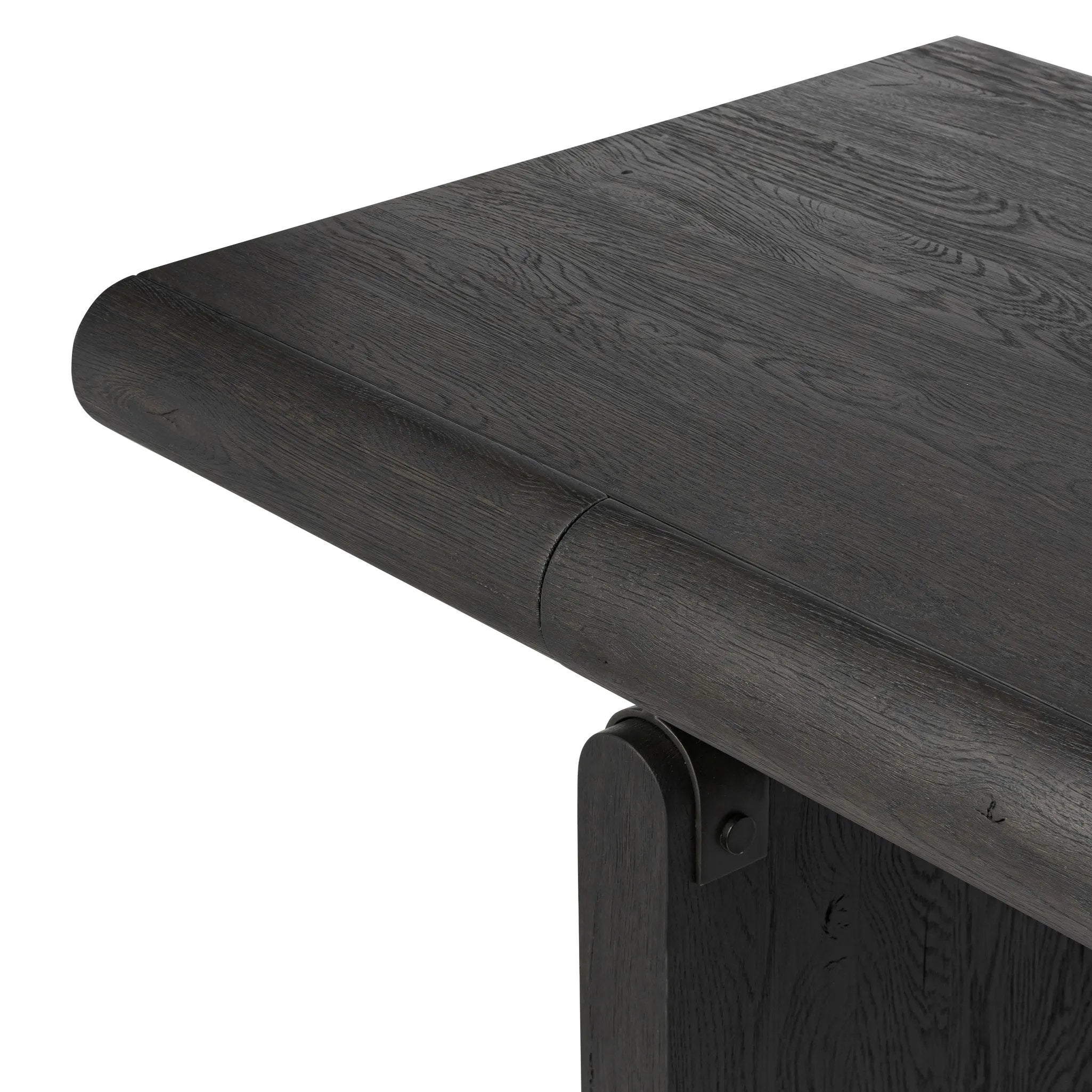 Bring a beautifully contoured look to your workspace with a desk inspired by Italian postmodernism. Connected by iron brackets, a dual-panel base supports a spacious tabletop of worn black oak, crafting a float-like look. Four drawers keep frequently used items within reach Amethyst Home provides interior design, new home construction design consulting, vintage area rugs, and lighting in the Charlotte metro area.