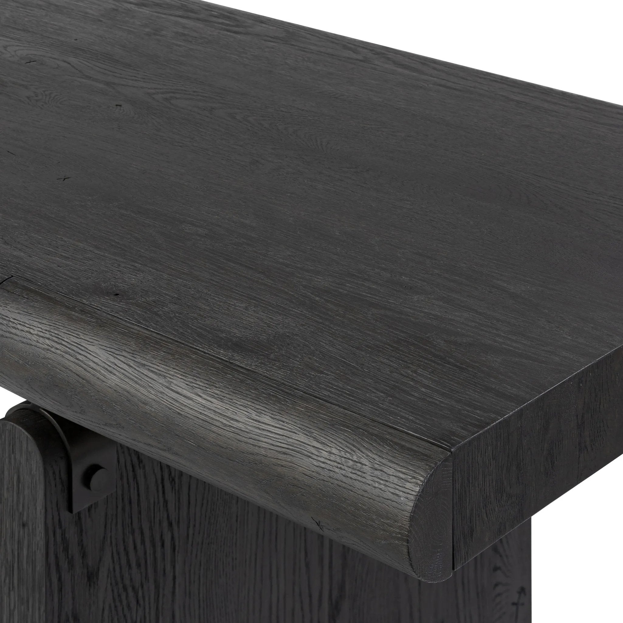 Bring a beautifully contoured look to your workspace with a desk inspired by Italian postmodernism. Connected by iron brackets, a dual-panel base supports a spacious tabletop of worn black oak, crafting a float-like look. Four drawers keep frequently used items within reach Amethyst Home provides interior design, new home construction design consulting, vintage area rugs, and lighting in the Monterey metro area.