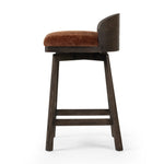 Featuring Cloris Altair Sienna Swivel Bar + Counter Stool by Four Hands at Amethyst Home. Channel vintage vibes with a swivel stool perfectly sized for the bar. Crafted of dark-finished oak, a low, molded back adds a playful touch, while an upholstered seat offers comfort and color. Finished off with a memory swivel to ensure the stool's curved wood back st. Amethyst Home provides interior design, new home construction design consulting, vintage area rugs, and lighting in the Charlotte metro area.