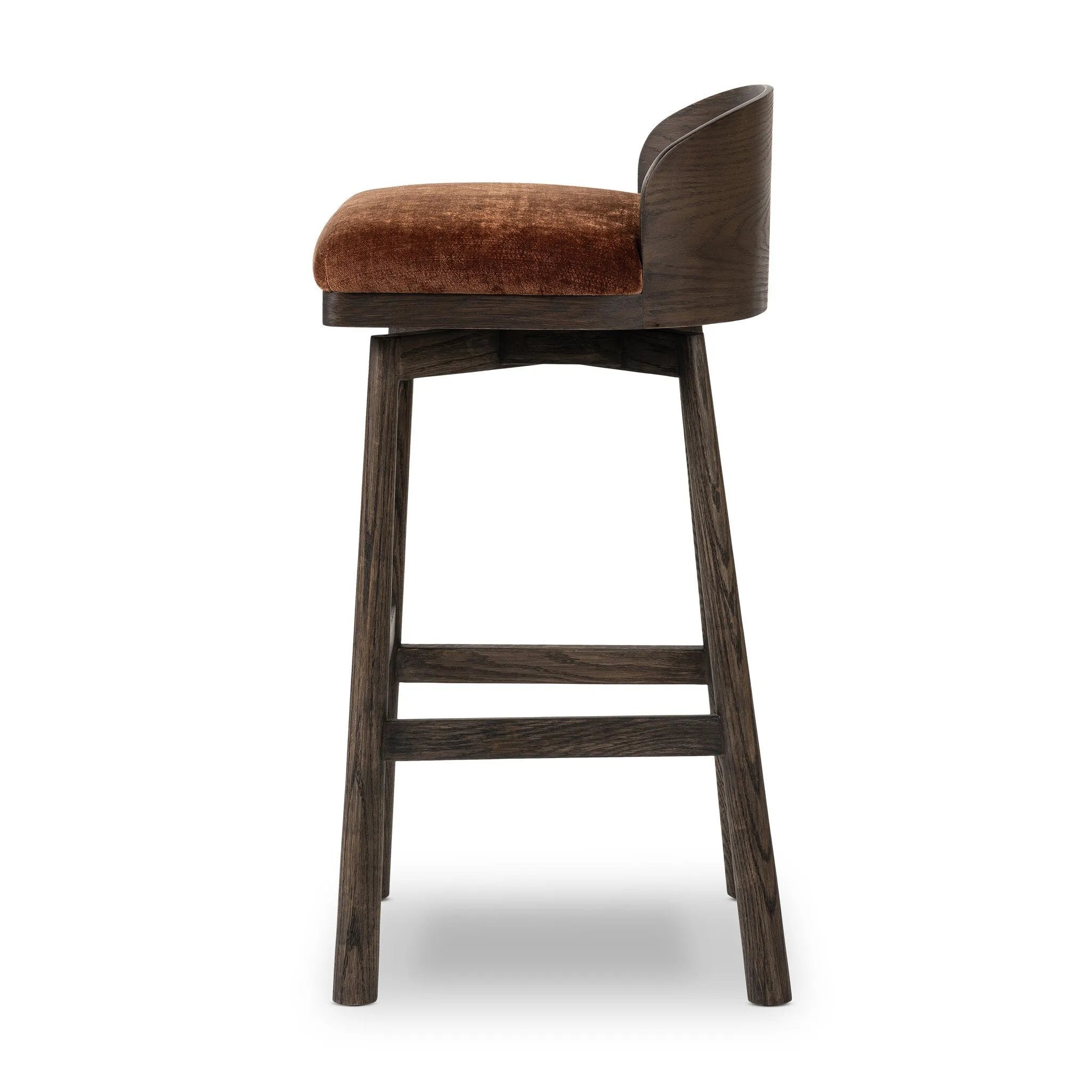 Featuring Cloris Altair Sienna Swivel Bar + Counter Stool by Four Hands at Amethyst Home. Channel vintage vibes with a swivel stool perfectly sized for the bar. Crafted of dark-finished oak, a low, molded back adds a playful touch, while an upholstered seat offers comfort and color. Finished off with a memory swivel to ensure the stool's curved wood back s. Amethyst Home provides interior design, new home construction design consulting, vintage area rugs, and lighting in the Des Moines metro area.