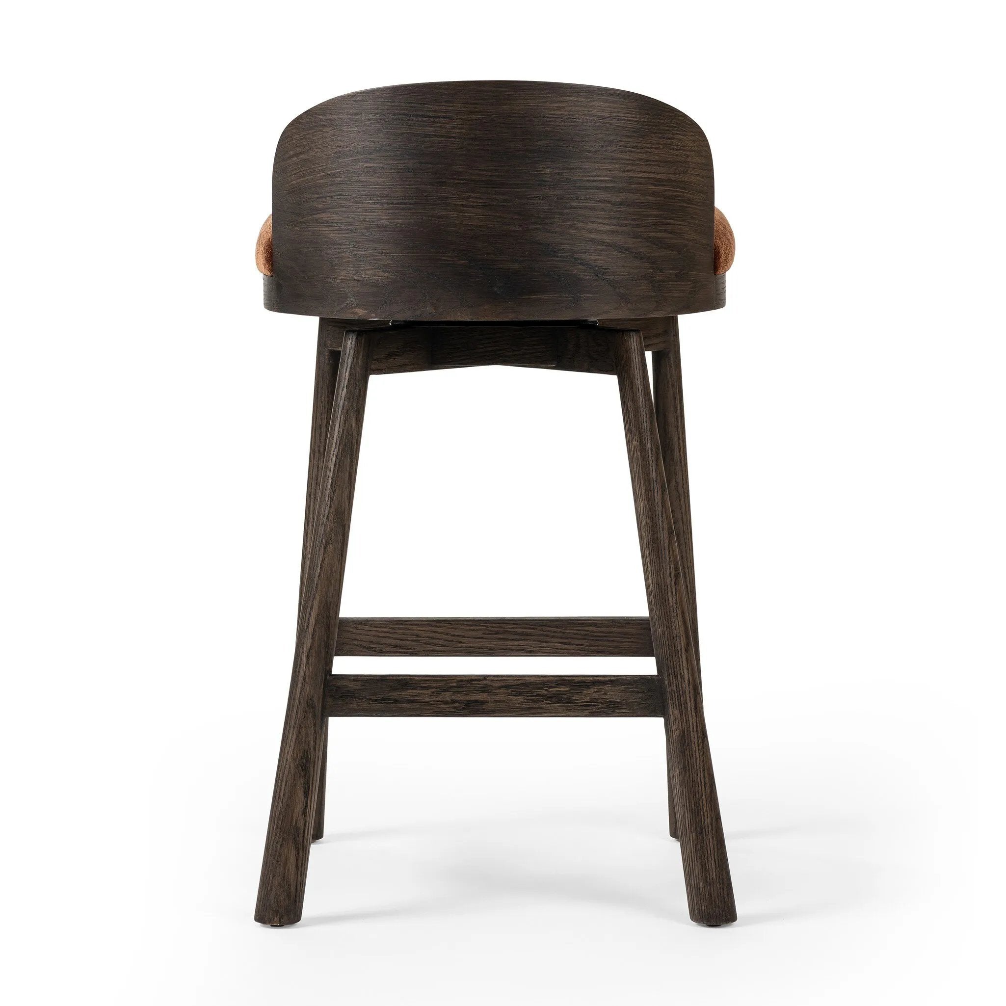 Featuring Cloris Altair Sienna Swivel Bar + Counter Stool by Four Hands at Amethyst Home. Channel vintage vibes with a swivel stool perfectly sized for the bar. Crafted of dark-finished oak, a low, molded back adds a playful touch, while an upholstered seat offers comfort and color. Finished off with a memory swivel to ensure the stool's curved wood back s. Amethyst Home provides interior design, new home construction design consulting, vintage area rugs, and lighting in the Scottsdale metro area.