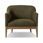 A Swedish Gustavian inspired captain chair gets a modern update with high arms and an exposed frame. The tight cushion in olive fabric paired with buff parawood lends a luxe natural feel Amethyst Home provides interior design, new home construction design consulting, vintage area rugs, and lighting in the Monterey metro area.