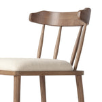 Featuring Colter Antwerp Natural Counter Stool by Four Hands at Amethyst Home. Made from solid ash with an amber finish, this versatile counter stool pairs an airy back with tapered spindles, for a simple, inviting look. A fixed upholstered seat of high-performance fabric adds a smart, comfortable touch. Steam regularly for a crisper fabric look. Performa. Amethyst Home provides interior design, new home construction design consulting, vintage area rugs, and lighting in the Los Angeles metro area.