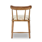 Featuring Colter Antwerp Natural Dining Chair by Four Hands at Amethyst Home. Made from solid ash with an amber finish, this versatile dining chair pairs an airy back with tapered spindles, for a simple, inviting look. Fixed upholstered seat of high-performance fabric adds a smart, comfortable touch. Performance fabrics are specially created to withstand sp. Amethyst Home provides interior design, new home construction design consulting, vintage area rugs, and lighting in the Calabasas metro area.