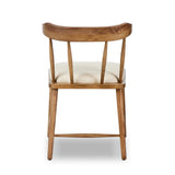 Featuring Colter Antwerp Natural Dining Chair by Four Hands at Amethyst Home. Made from solid ash with an amber finish, this versatile dining chair pairs an airy back with tapered spindles, for a simple, inviting look. Fixed upholstered seat of high-performance fabric adds a smart, comfortable touch. Performance fabrics are specially created to withstand sp. Amethyst Home provides interior design, new home construction design consulting, vintage area rugs, and lighting in the Calabasas metro area.