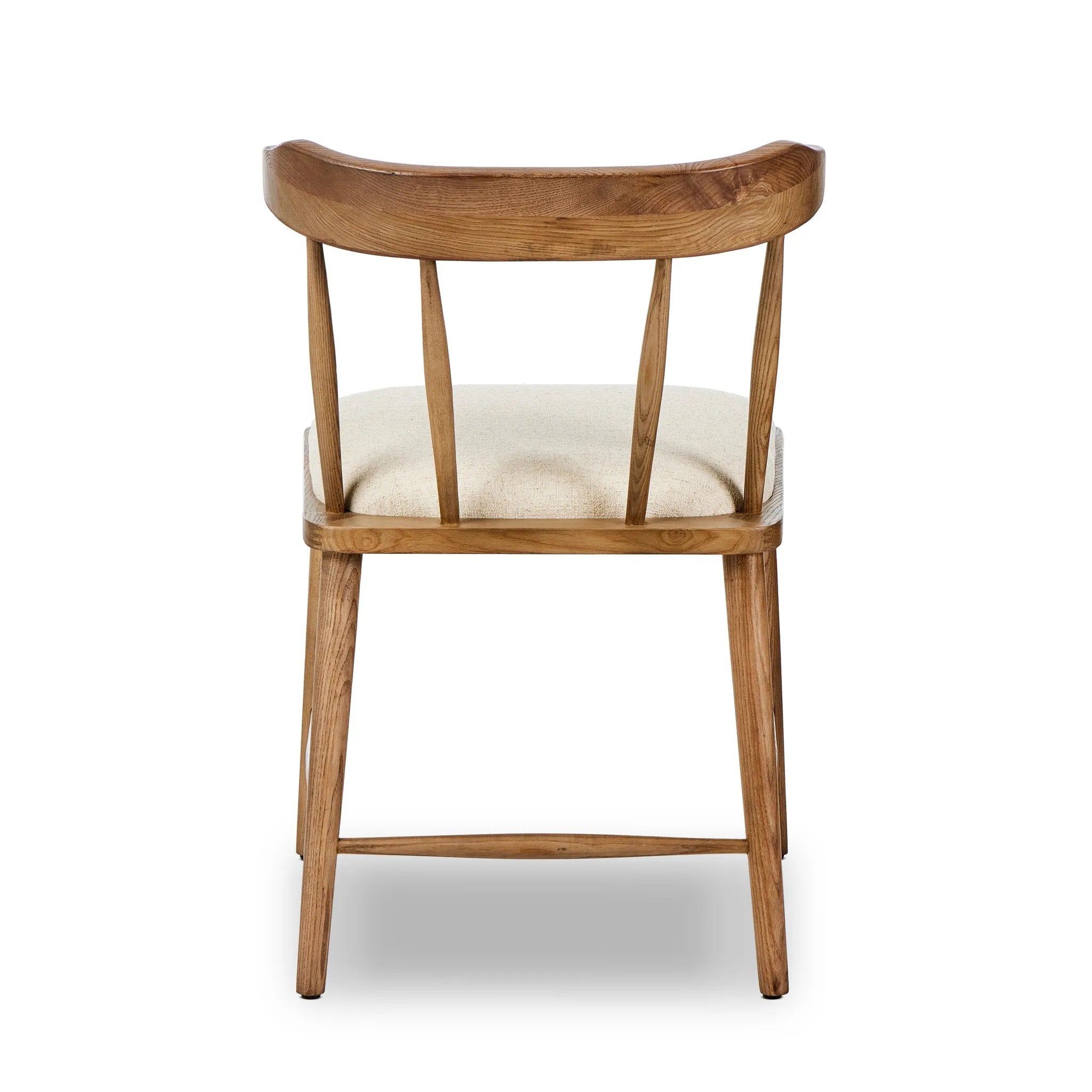 Featuring Colter Antwerp Natural Dining Chair by Four Hands at Amethyst Home. Made from solid ash with an amber finish, this versatile dining chair pairs an airy back with tapered spindles, for a simple, inviting look. Fixed upholstered seat of high-performance fabric adds a smart, comfortable touch. Performance fabrics are specially created to withstand sp. Amethyst Home provides interior design, new home construction design consulting, vintage area rugs, and lighting in the Calabasas metro area.