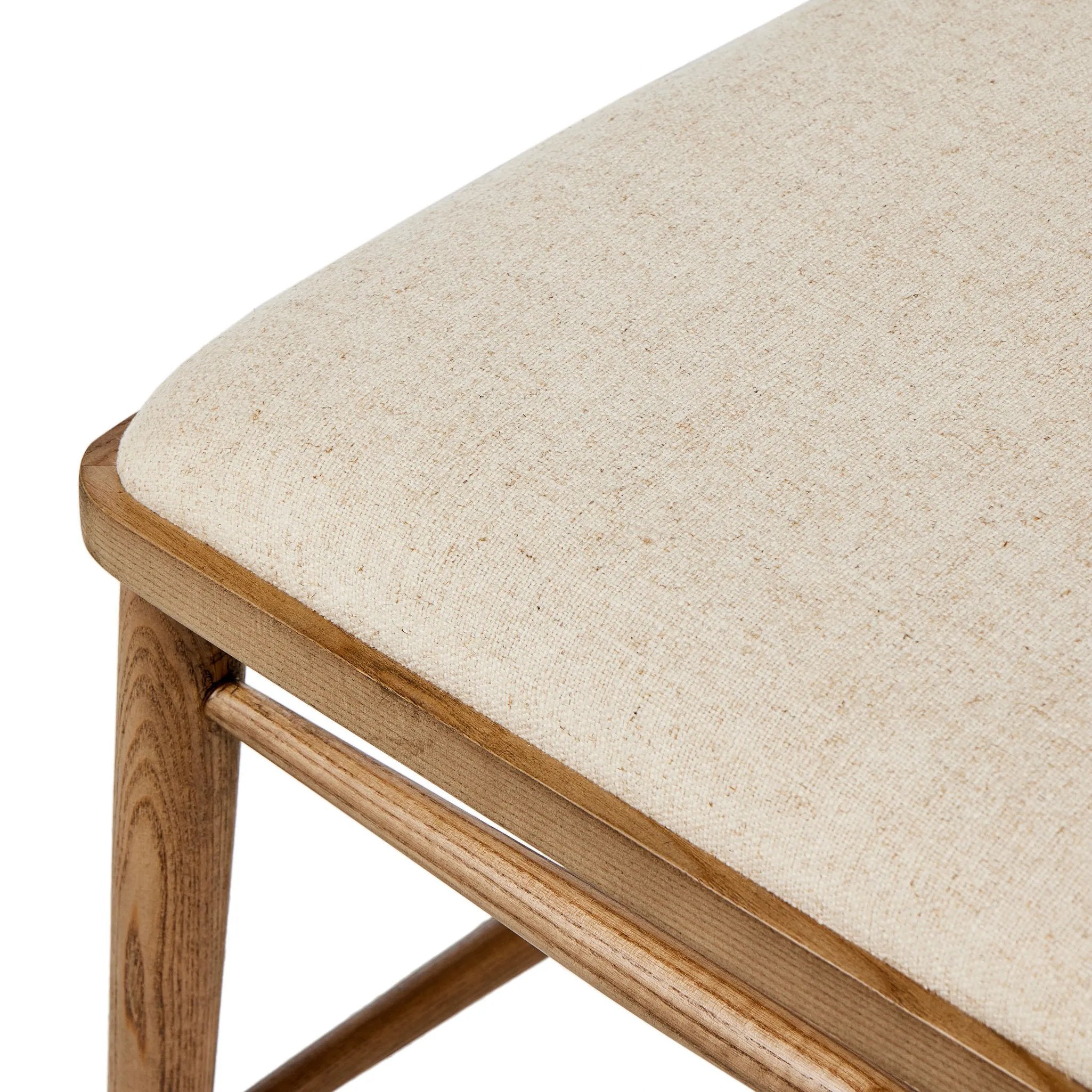 Featuring Colter Antwerp Natural Dining Chair by Four Hands at Amethyst Home. Made from solid ash with an amber finish, this versatile dining chair pairs an airy back with tapered spindles, for a simple, inviting look. Fixed upholstered seat of high-performance fabric adds a smart, comfortable touch. Performance fabrics are specially created to withstand s. Amethyst Home provides interior design, new home construction design consulting, vintage area rugs, and lighting in the Washington metro area.