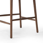 Made from solid ash with a vintage finish, this versatile counter stool pairs an airy back with tapered spindles, for a simple, inviting look. A fixed upholstered seat of top-grain leather adds a smart, comfortable touch Amethyst Home provides interior design, new home construction design consulting, vintage area rugs, and lighting in the Charlotte metro area.