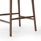 Made from solid ash with a vintage finish, this versatile counter stool pairs an airy back with tapered spindles, for a simple, inviting look. A fixed upholstered seat of top-grain leather adds a smart, comfortable touch Amethyst Home provides interior design, new home construction design consulting, vintage area rugs, and lighting in the Charlotte metro area.