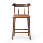 Made from solid ash with a vintage finish, this versatile counter stool pairs an airy back with tapered spindles, for a simple, inviting look. A fixed upholstered seat of top-grain leather adds a smart, comfortable touch Amethyst Home provides interior design, new home construction design consulting, vintage area rugs, and lighting in the Salt Lake City metro area.