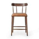 Made from solid ash with a vintage finish, this versatile counter stool pairs an airy back with tapered spindles, for a simple, inviting look. A fixed upholstered seat of top-grain leather adds a smart, comfortable touch Amethyst Home provides interior design, new home construction design consulting, vintage area rugs, and lighting in the Salt Lake City metro area.