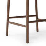 Made from solid ash with a vintage finish, this versatile counter stool pairs an airy back with tapered spindles, for a simple, inviting look. A fixed upholstered seat of top-grain leather adds a smart, comfortable touch Amethyst Home provides interior design, new home construction design consulting, vintage area rugs, and lighting in the San Diego metro area.